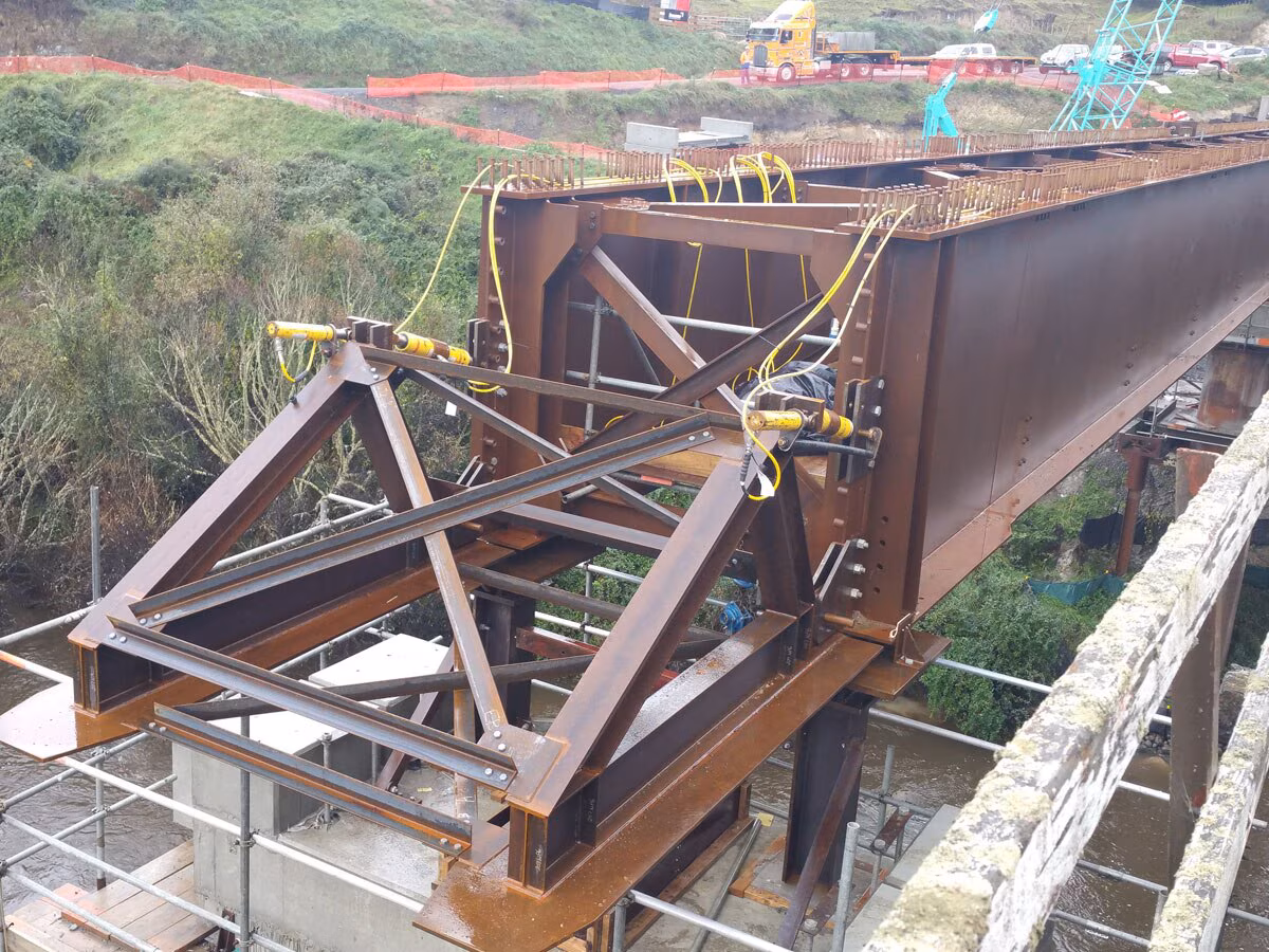 Safely Erecting a Bridge Over Water with a Hydraulic Driven Launching Nose
